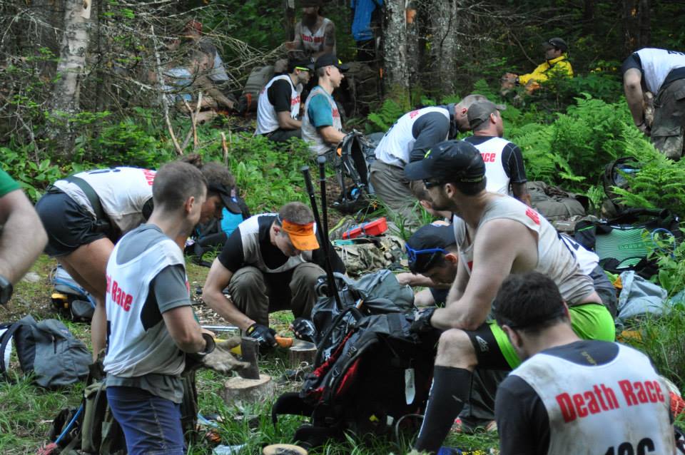 Athletes resting in the woods with their packs during the Peak Death Race Spartan Death Race