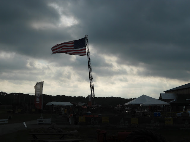 Image of an American flag being flown off of a ladder on a fire truck at the 2012 Hero Rush Obstacle Course Race