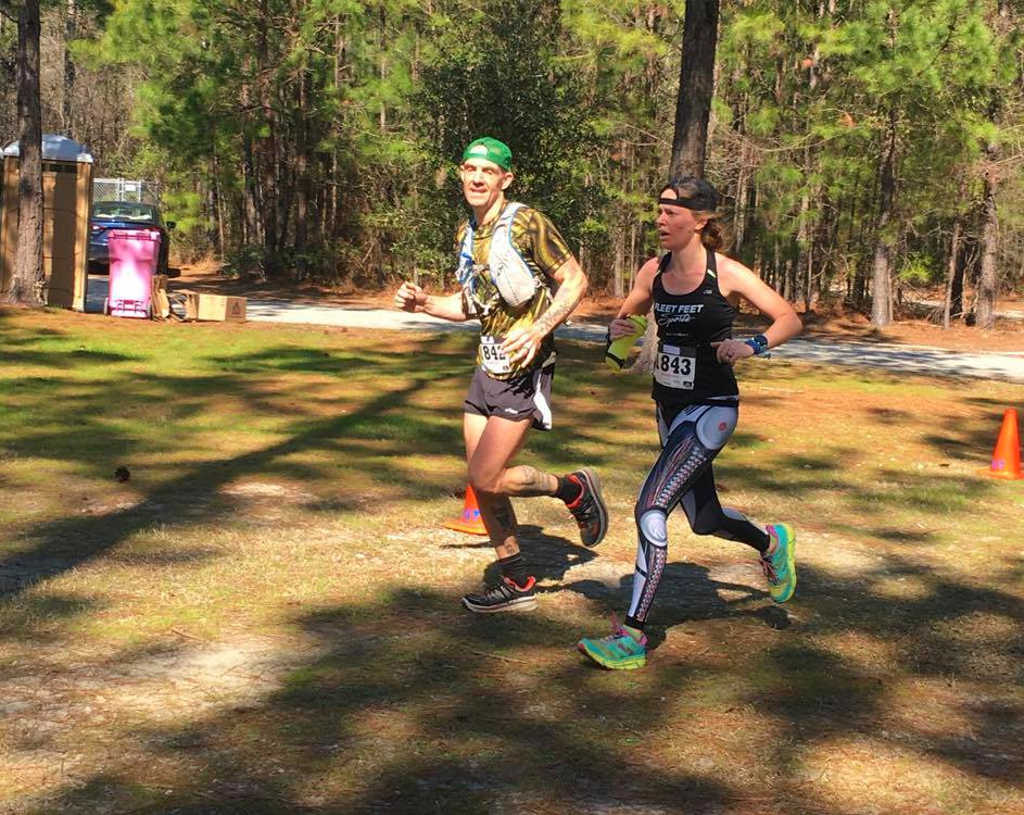 Heather Hart and Geoffrey Hart finishing a trail race at a hard effort Zone 4 pace