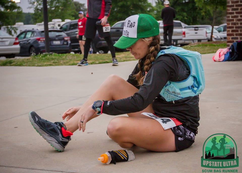 Heather hart changing her shoes mid ultramarathon