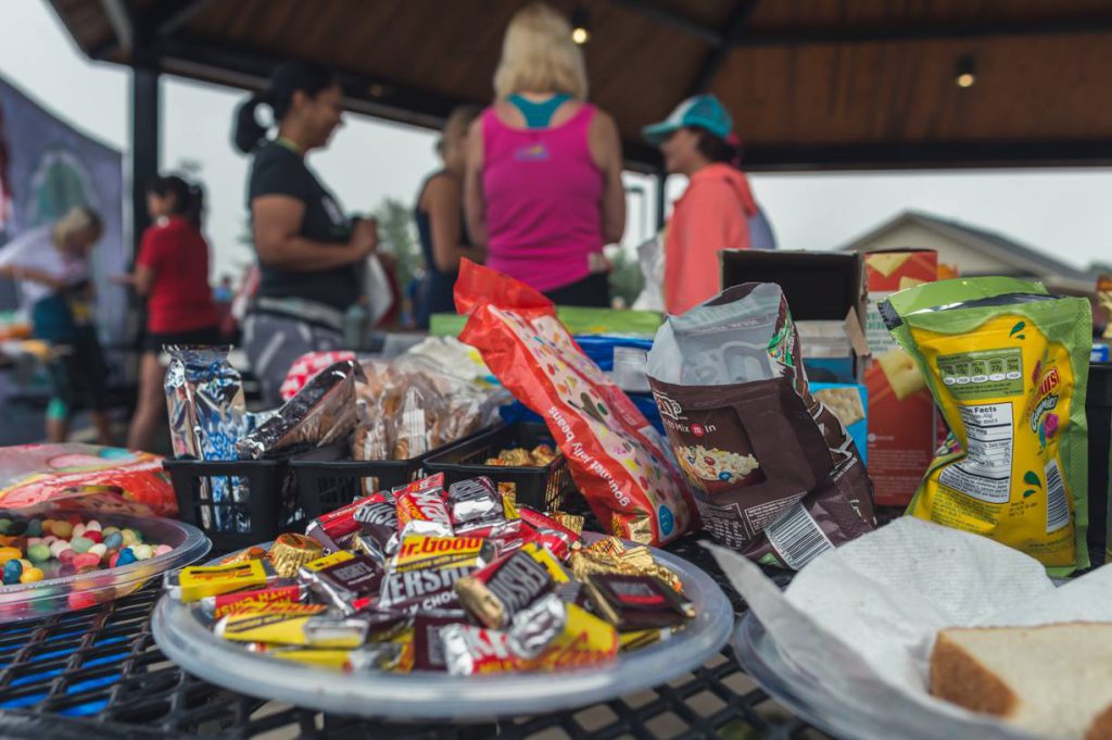 Snacks on an ultramarathon aid station table 