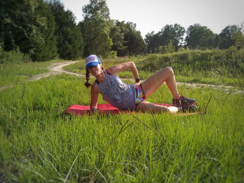 woman demonstrating clam shell exercises for lateral hip strength