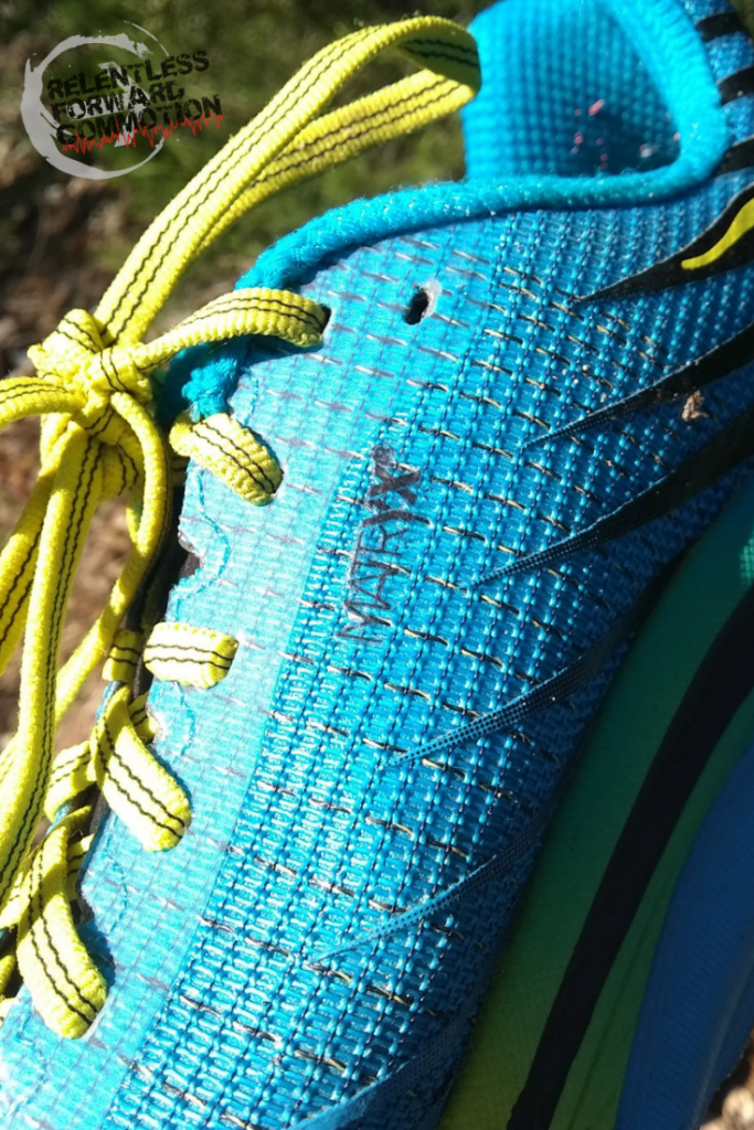 Closeup image of the fabric on the upper of the Hoka One One EVO Mafate Trail Running Shoe 