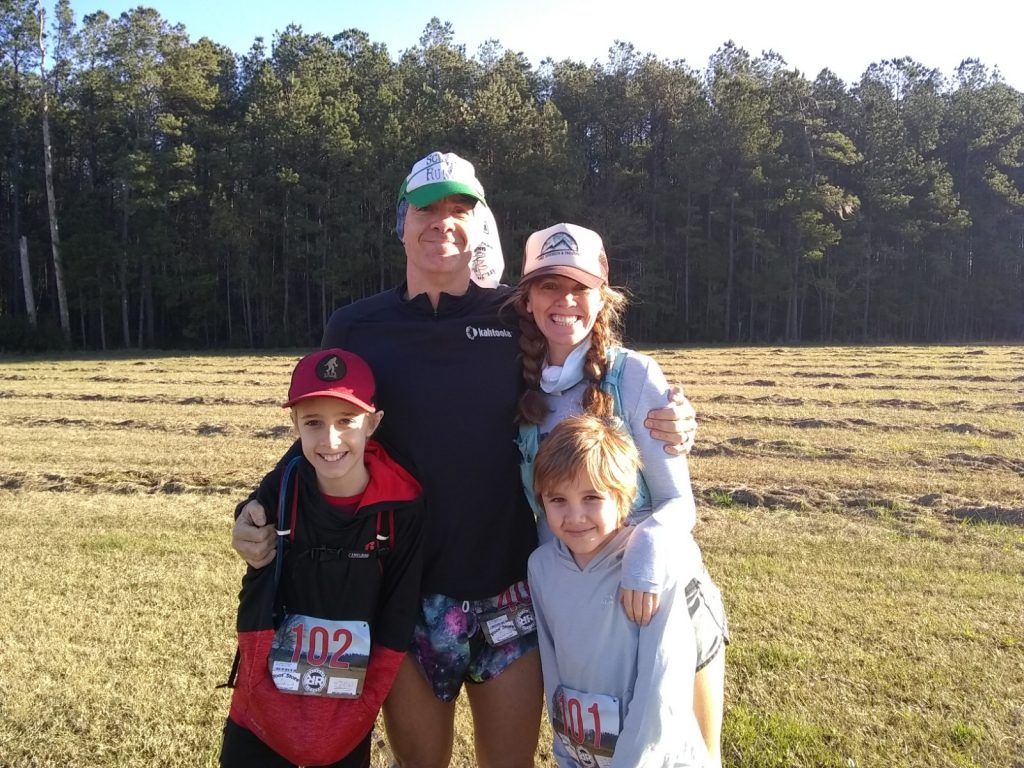 Geoff and Heather Hart with their two children at the start of the Retreat Repeat 8 hour ultramarathon
