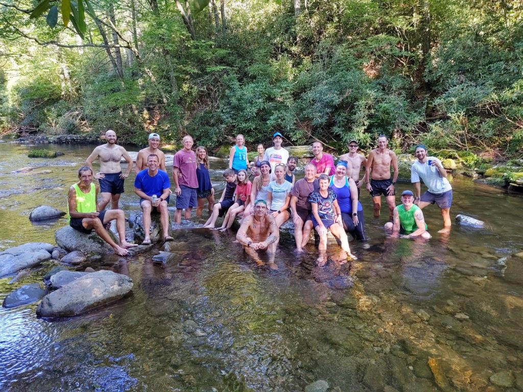 Group of runners cooling off after a summer running event