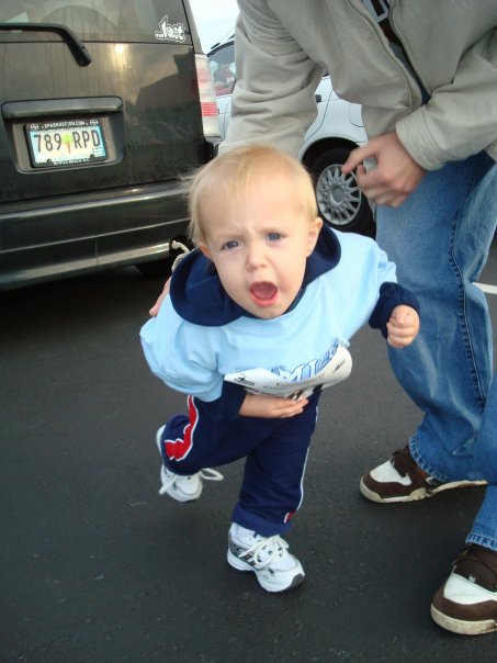 Toddler at a fun run yelling at the camera 