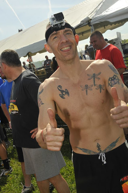 Geoffrey Hart smiling and holding thumbs up with GoPro on head, getting ready to run the 2013 Hero Rush OCR