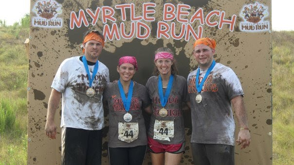 2011 Myrtle Beach Mud Run Participants covered in mud