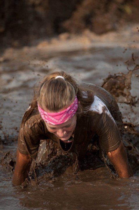 2011 Myrtle Beach Mud  Run Participant Heather Hart dives into a mud pit