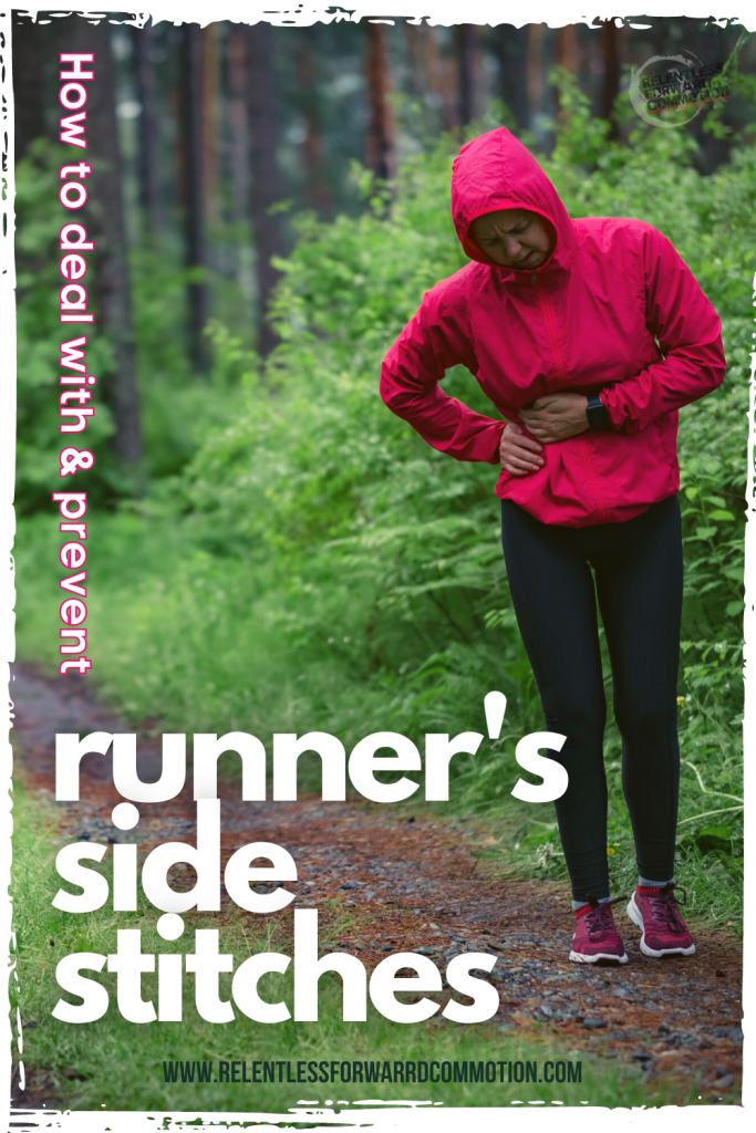 Women trail running has stopped and is holding her side in pain, experiencing a runner's side stitch.  How to Avoid Side Stitches When Running: The Myths & Science behind the Dreaded Side Stitch