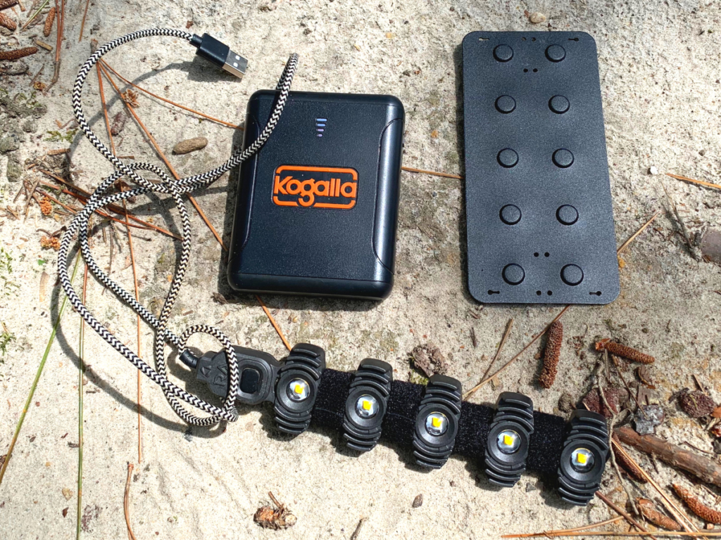 Image of the Kogalla lighting system, as well as battery pack and magnet board