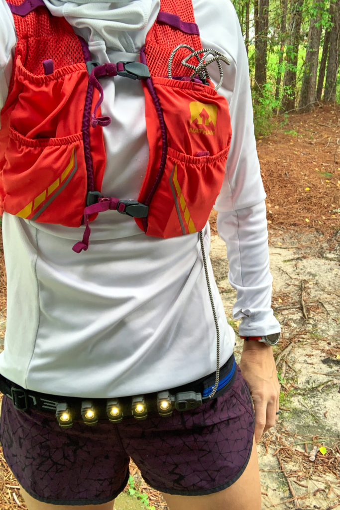 Kogalla RA Adventure Light attached to a waist belt on a runner