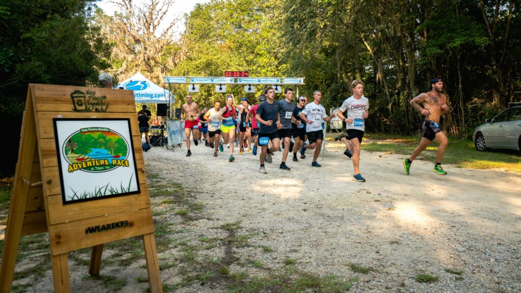 Racers begin the trail running portion of the 2022 KFB Lynches River Adventure Race