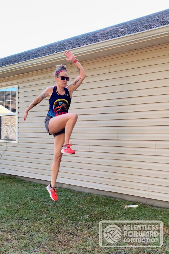 Heather Hart performing a power skip plyometrics for runners exercise 