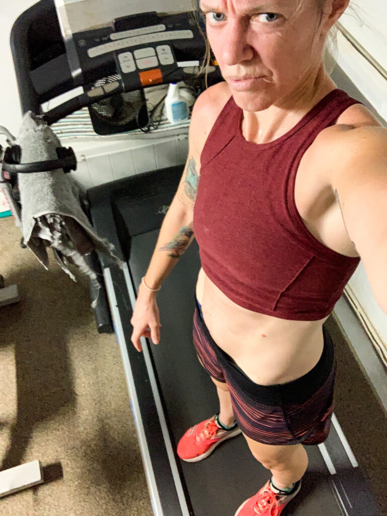 One of the major disadvantages of running on a treadmill can be monotony, as demonstrated in this photo of Heather Hart on a treadmill making a disappointed face