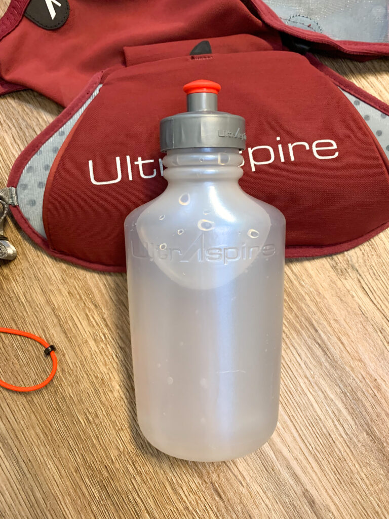 insulated bottle compartment of the UltrAspire Basham Race Vest
