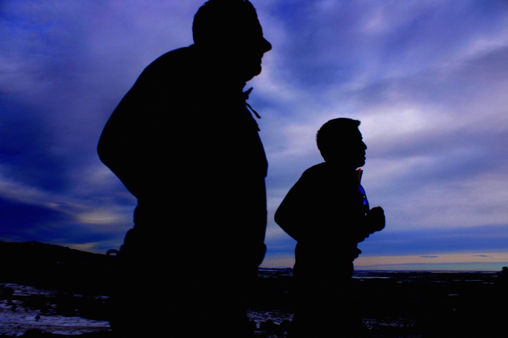 Image of runners in the dark during a winter trail run